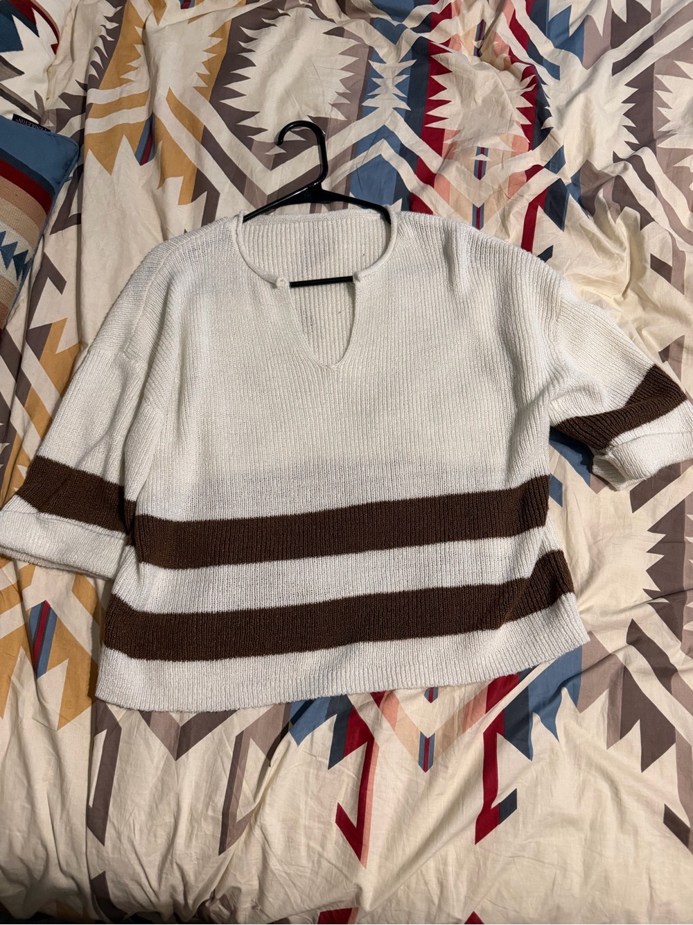 Brown and white sweater